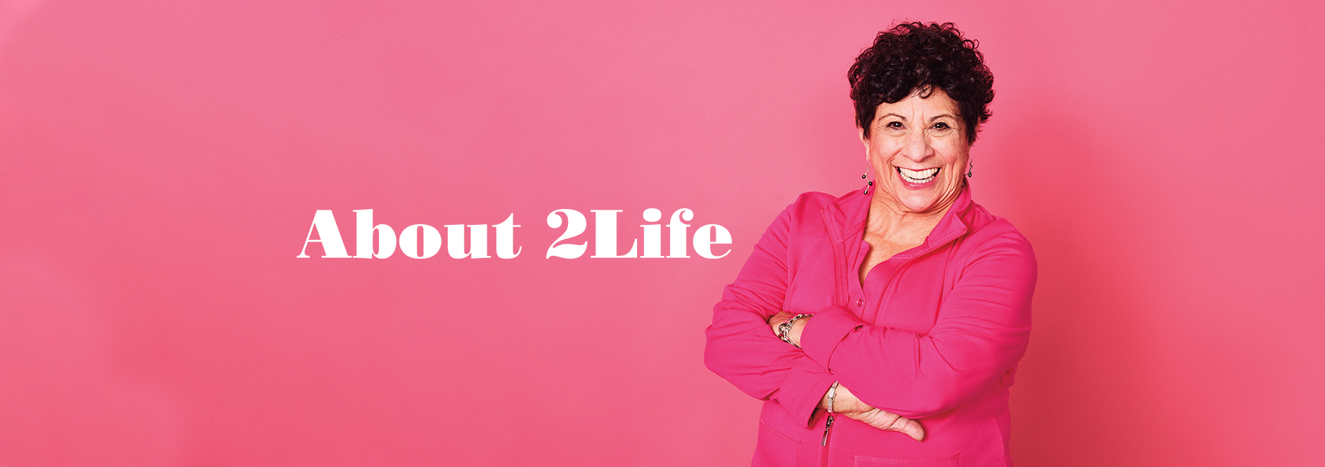About 2Life banner with woman in pink against a pink background