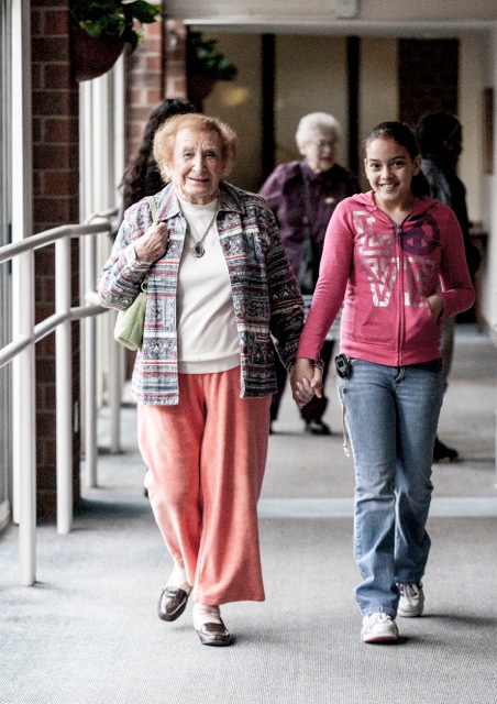 Volunteer walks with a 2Life resident