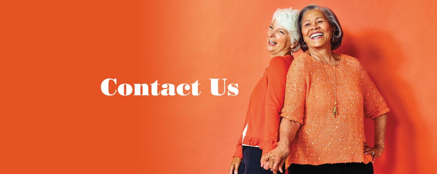 Contact Us banner with two women in orange against an orange background