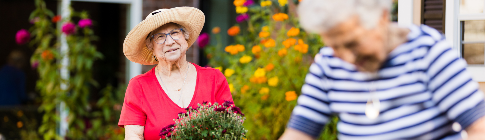 Two residents gardening outdoors