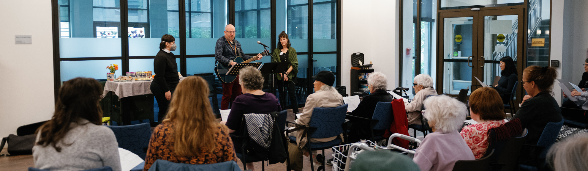 Residents and staff connecting at a campus event