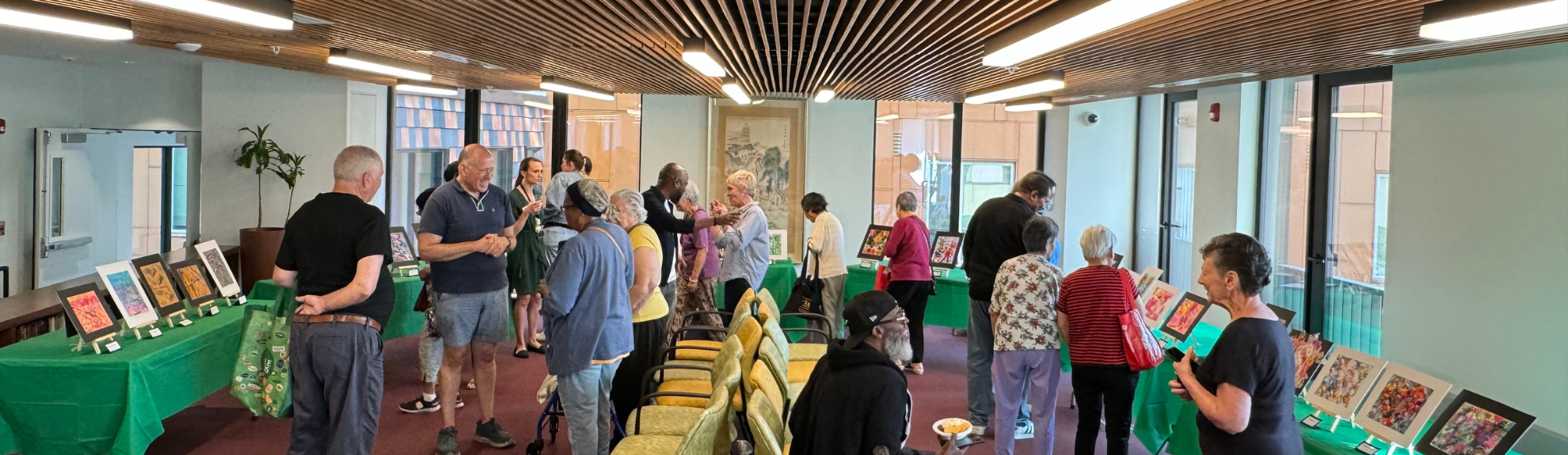 Residents connecting at an art show at a 2Life community