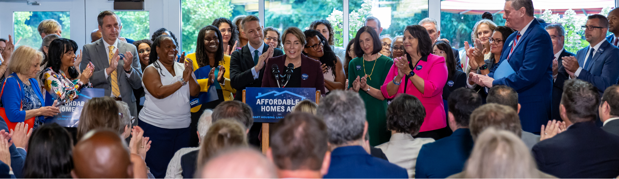 Political figures at an event hosted at a 2Life community