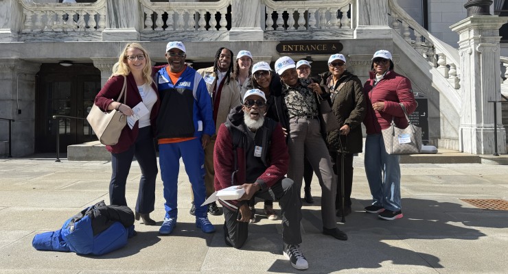 2Life staff and residents posing outside of the state house in Boston, MA