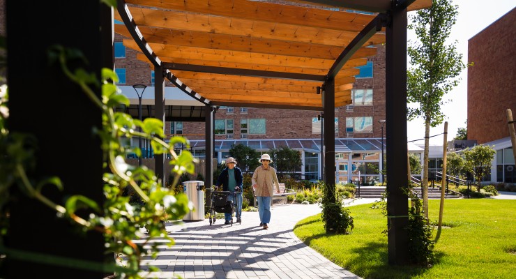 Outdoors in the village center at Brighton Campus