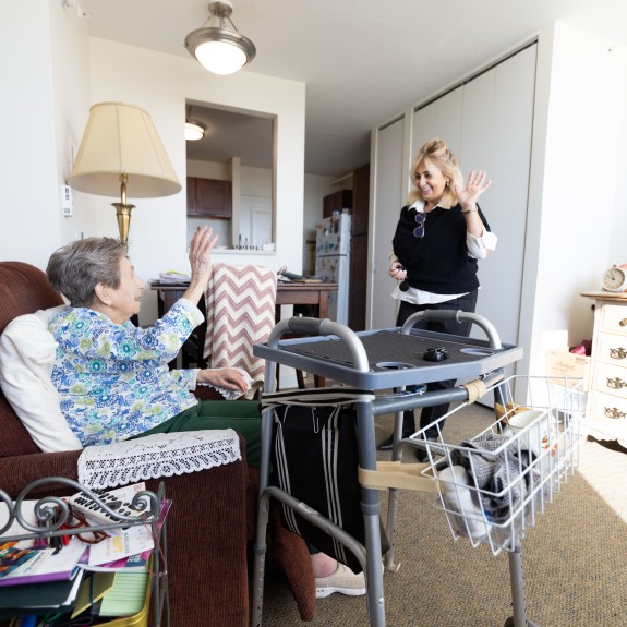 Healthcare working assisting 2Life resident in their apartment