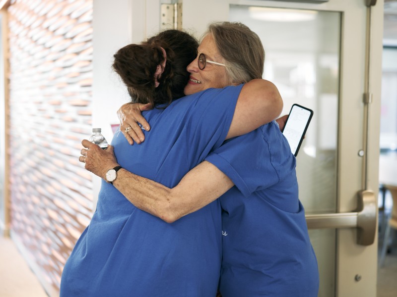 2Life resident and staff member connecting