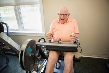 A man working on an exercise machine