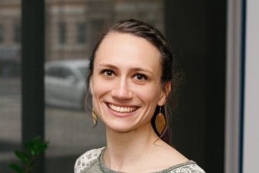 Madeline Ludtke, Therapeutic Arts Manager, smiling in a professional headshot.